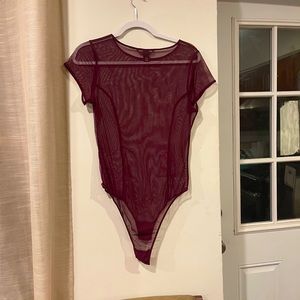 Sheer maroon Victoria secrets body suit never worn. Large